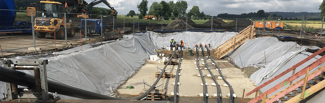 panned-out-image-multiple-cable-pulls-in-a-trench-1280p